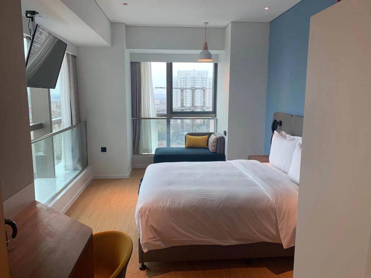 Holiday Inn Express Shanghai Baoyang By Ihg Екстер'єр фото