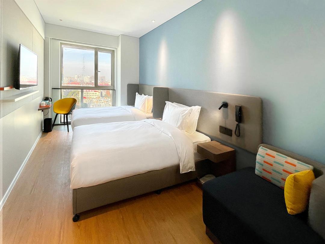 Holiday Inn Express Shanghai Baoyang By Ihg Екстер'єр фото
